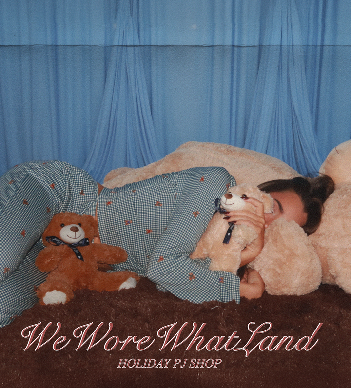 Person lying on carpet with teddy bears, wearing pajamas, with 'We Wore What Land' text.